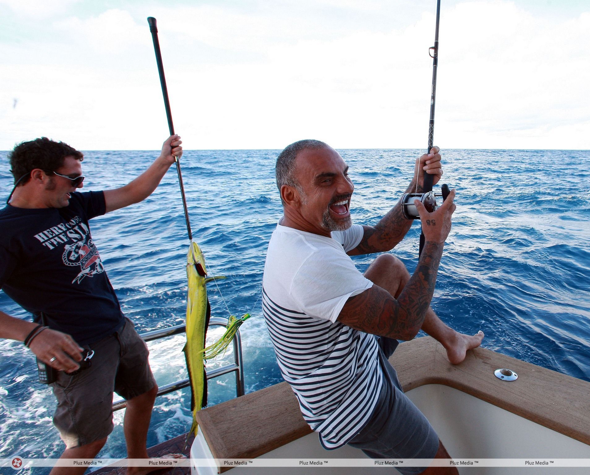 Christian Audigier catches a huge fish with his girlfriend Nathalie Sorensen | Picture 124256